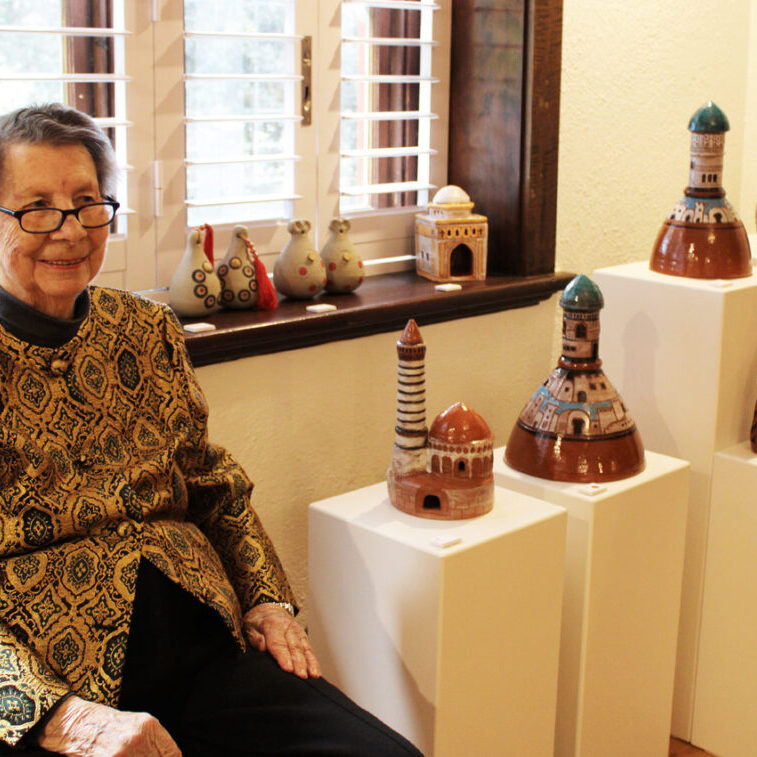 Judy Lorraine with come of her ceramics work at the opening of her exhibition at WAS Gallery